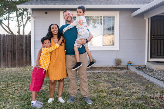 Multiracial family portrait out-of-door
