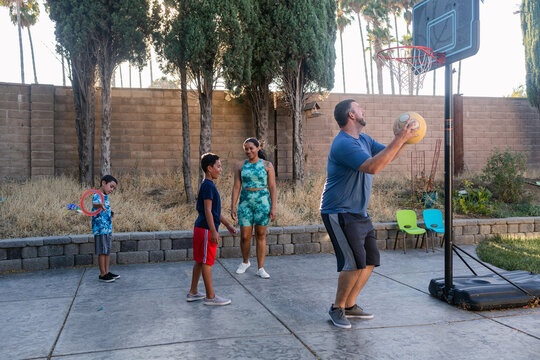 Diverse Family Playing Basketball Outdoor