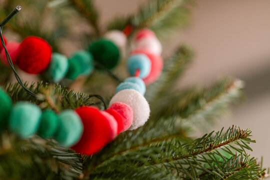 Pompon Garland On Christmas Tree