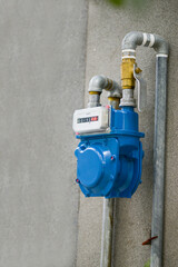 Residential natural gas meter measuring gas consumption.