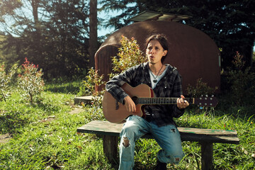 Latin musician singing outdoors
