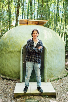 Portrait of a young Latino in a bamboo forest