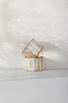 Frontal view of rings for table napkins made of mother of pearl