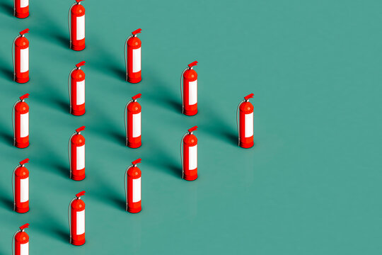 red fire extinguishers on green background