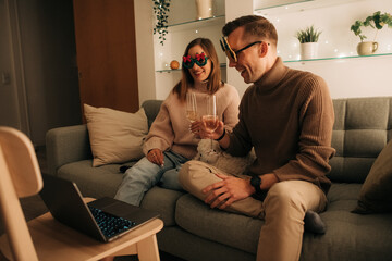 Couple having a video call at home