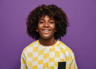 Cheerful black child with curly hair