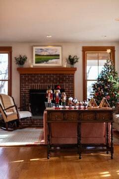  Nutcracker Toys in row in Home during Christmas with Tree  