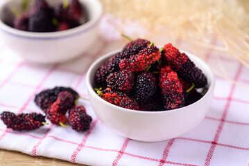 Fresh mulberry fruit in bowl, Healthy tropical fruit