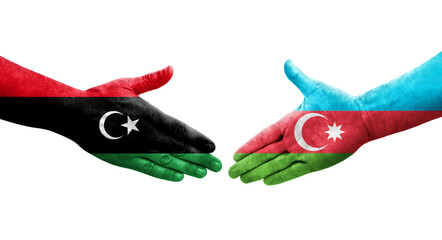 Handshake between Azerbaijan and Libya flags painted on hands, isolated transparent image.