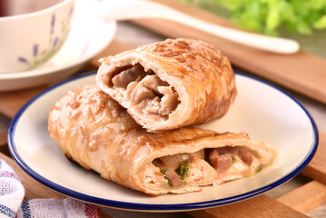 Delicious chicken roll on white plate