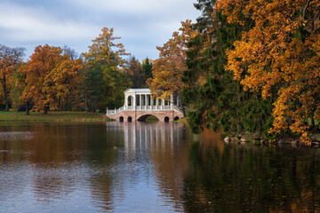Marble bridge on the shore of a Large pond in the Catherine Park in Tsarskoye Selo on an autumn...