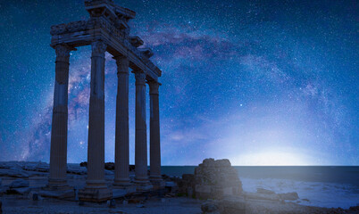 Temple of Apollo with milky way galaxy