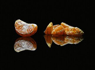 tangerine on black background
