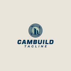 Logo design of a combination of a camera lens and a building in a retro style.