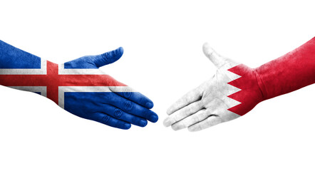 Handshake between Bahrain and Iceland flags painted on hands, isolated transparent image.