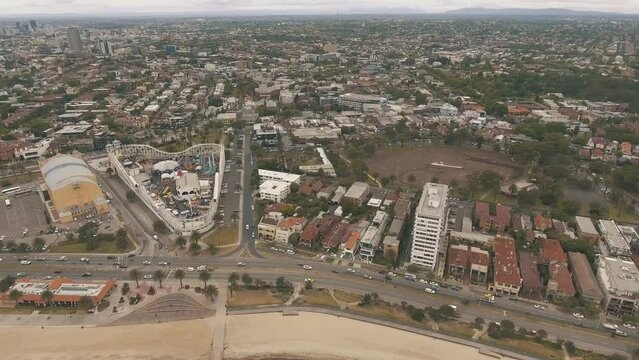 Drone Aerial Cars Driving On St Kilda Road In Melbourne By The Sandy Beach