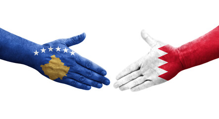 Handshake between Bahrain and Kosovo flags painted on hands, isolated transparent image.