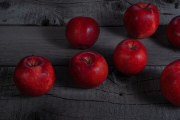 Red Apples Fresh Ripe Fruit on Wooden Rustic Table. Foreground Focus Photo.