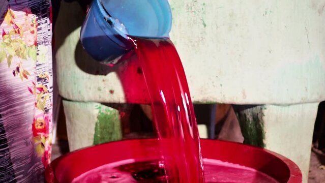 local senior farmer red wine filtering fining to finishing before bottling