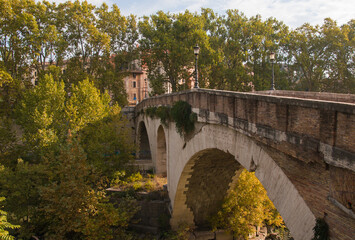Tiber River in Rome, Italy: view of Tiber Island and Fabricium Bridge, Lazio Italy