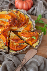 home made pumpkin quiche on a table