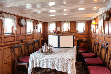 Luxurious wood paneled private steam yacht liner of historic millionaire in port Belle Epoque interiors