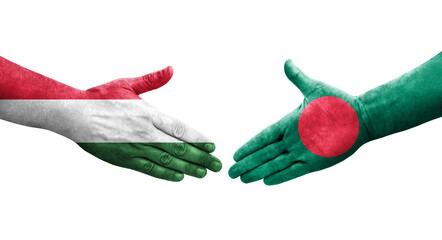 Handshake between Bangladesh and Hungary flags painted on hands, isolated transparent image.