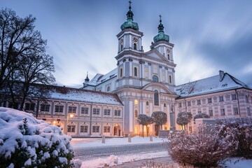 View of basilica cathederal building facade in snowy evening in Waldsassen
