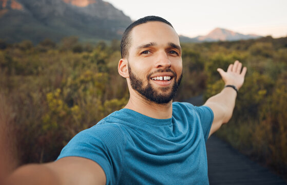 Fitness, running and man taking a selfie on mountain during outdoor run. Young runner on hike, workout and exercise in nature takes picture of scenic view. Hiking, travel and adventure in Australia