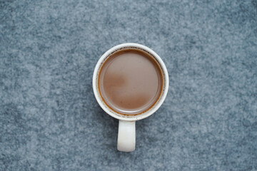 A cup of milk coffee. Drinks at leisure time.