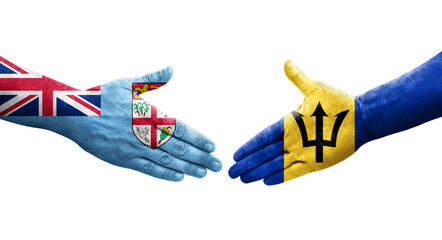Handshake between Barbados and Fiji flags painted on hands, isolated transparent image.