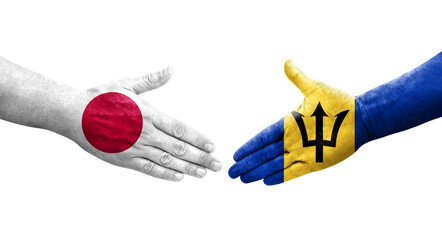 Handshake between Barbados and Japan flags painted on hands, isolated transparent image.