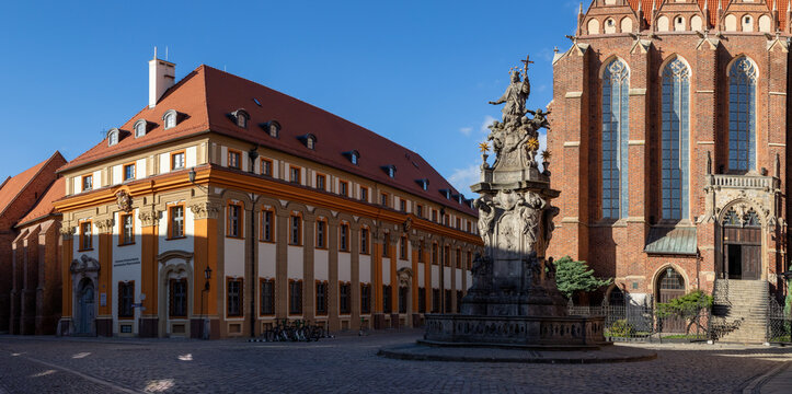 Panoramic view of the building of the Pastoral Center of the Archdiocese of Wroclaw and  monument to John of Nepomuk in Ostrow Tumski