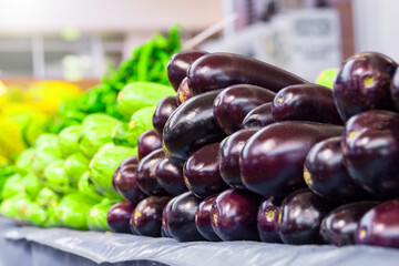 Vegetable farmer market counter: colorful various fresh organic healthy vegetables at grocery store. Healthy natural food concept.