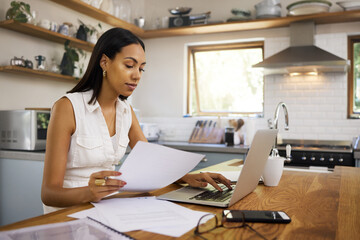 Documents, laptop or business woman in kitchen with financial research, company budget or survey...