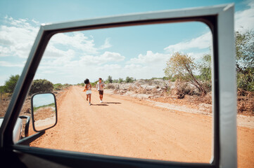Safari, diversity and couple on road trip in a summer romance, holiday and vacation outdoors...