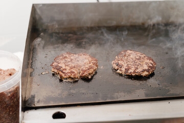 The process of making a burger. Ingredients for making a burger. Everything you need to make a burger is laid out on the table.
