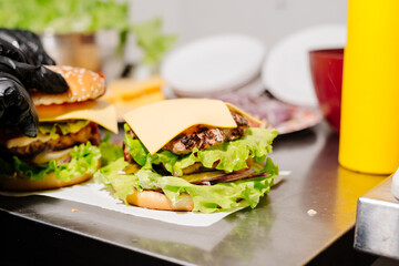 The process of making a burger. Ingredients for making a burger. Everything you need to make a burger is laid out on the table.
