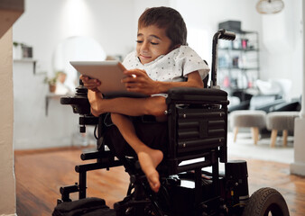 Wheelchair, disability and child with tablet for learning, video or games in home. Cerebral palsy, boy and disabled use tech on internet, app or web for development of brain, mind and education