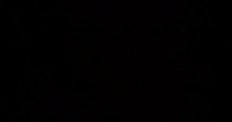 U.S. One Hundred Dollar Bill Flipping Downward Toward Camera - Powered by Adobe