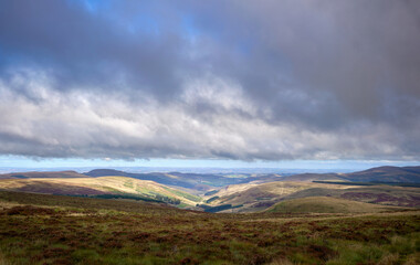 Views of Calroust Burn over the Scottish border from near Windy Gyle in the Cheviot Hills in Northumberland, England
