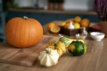Close up of pumpkins at the kitchen table in season