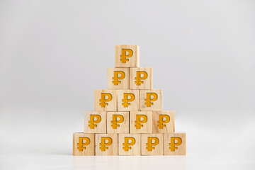 Russian Ruble signs on wooden block pyramid
