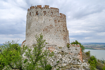 Ruins of an old castle. The surviving stone tower.