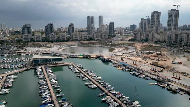 Beautiful aerial 4k panoramic view of Ashdod city and Marina during an overcast cloudy day- Ashdod Israel
