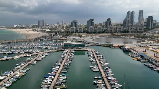 Beautiful aerial 4k panoramic view of Ashdod city and Marina during an overcast cloudy day- Ashdod Israel