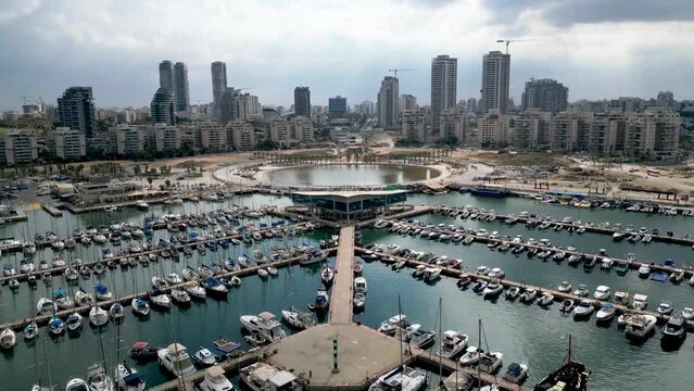 Beautiful aerial 4k panoramic view of Ashdod city and Marina during an overcast cloudy day- Ashdod Israel