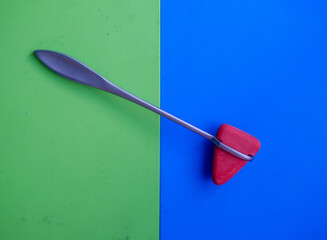 Taylor percussion reflex hammer on a colourful background 