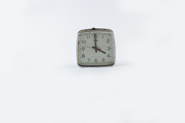 old clock isolated at white background, the classic clock is little rusty