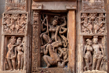Ancient sandstone carvings on the walls of the ancient Indian temple.13th century A.D. Suka Sari temple, Bhubaneswar, Odisha, India.